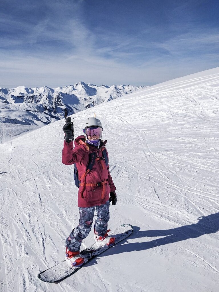 quel fazendo snowboard com suíça